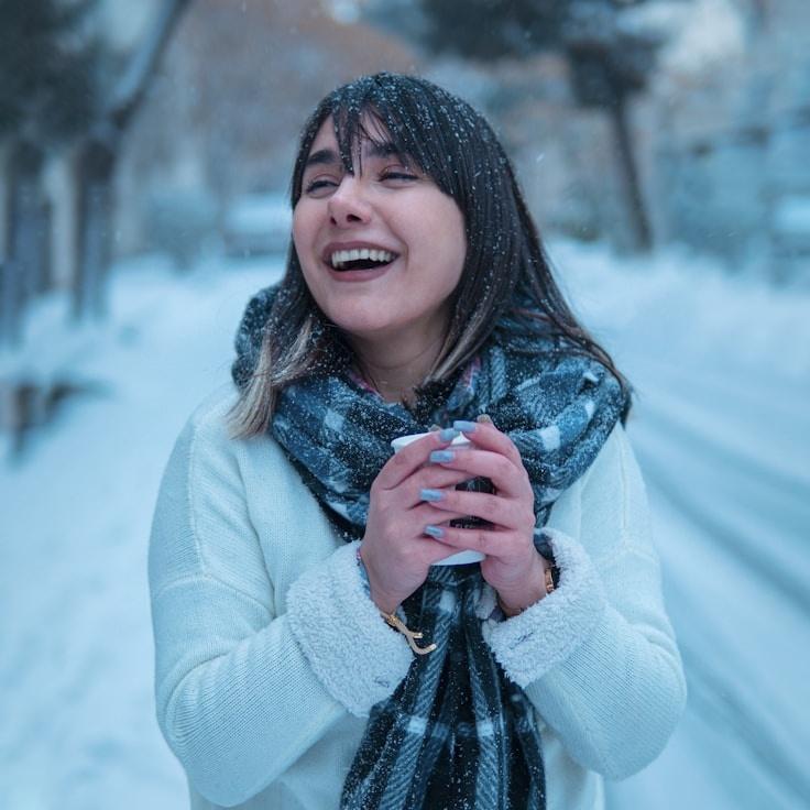 Aria Sharma, Lead Design Curator at Silver Forest Network, reviewing corporate floral arrangements